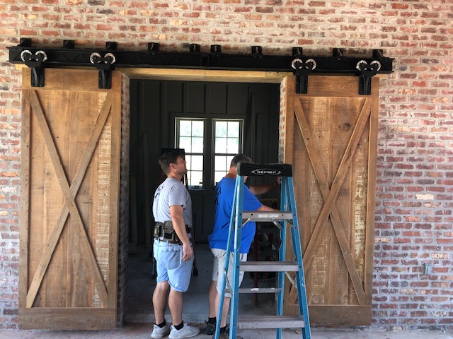 Two Professional working on wood doors